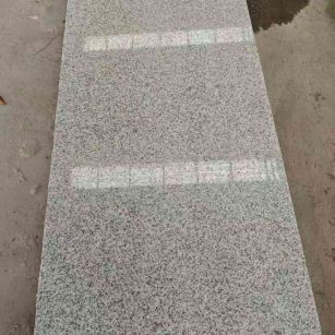 梅州芝麻白光面毛板